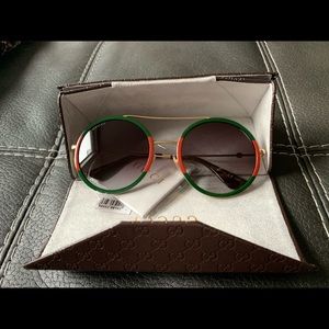 Gucci Round and Oval Sunglasses GG0061S